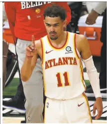  ?? Stacy Revere / Getty Images ?? Hawks guard Trae Young had 48 points and 11 assists in Atlanta’s 116113 Game 1 win over the Bucks in Milwaukee.