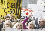  ?? THE CANADIAN PRESS FILES ?? Opponents of Bill C-69 rally outside a public Senate hearing on the bill in Calgary in April.