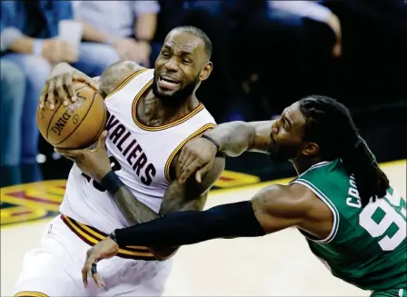  ?? ASSOCIATED PRESS ?? CLEVELAND CAVALIERS’ LEBRON JAMES (23) GOES UP FOR A SHOT Conference finals Tuesday in Cleveland. The Cavaliers won, 112-99. against Boston Celtics’ Jae Crowder (99) during the second half of Game 4 of the Eastern