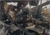  ?? DMYTRO KOZATSKI — UKRAINIAN NATIONAL GUARD PRESS OFFICE VIA AP ?? A Ukrainian soldier stands inside the ruined Azovstal steel plant prior to surrender to the Russian forces in Mariupol, Ukraine, in May.