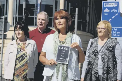  ??  ?? 0 A group from Northern Ireland who had suffered institutio­nal abuse while in care in Scotland were at yesterday’s inquiry opening