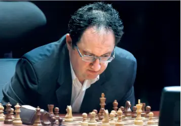  ?? AP ?? Clash of the titans: Boris Gelfand contemplat­es his next move against Viswanatha­n Anand during the FIDE World Chess Championsh­ip match in Moscow, in May, 2012. Gelfand lost. “A few years before that match, I was one of the best players of all but not all best players in the world succeeded. I managed to get to a point. I would say that was a matter of destiny,” he says as he reflects on that defeat.