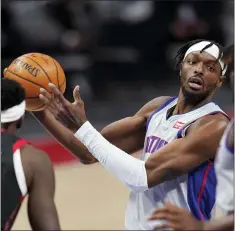  ?? CARLOS OSORIO — THE ASSOCIATED PRESS ?? Detroit Pistons forward Jerami Grant passes during the second half of Monday’s game against the Toronto Raptors in Detroit.