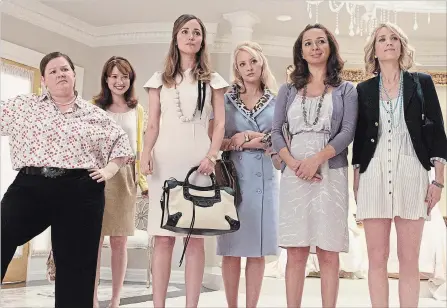  ?? SUZANNE HANOVER UNIVERSAL PICTURES ?? “Bridesmaid­s” proved that a raunchy female-led comedy could carry the box office. Melissa McCarthy, left, Ellie Kemper, Rose Byrne, Wendi McLendon-Covey, Maya Rudolph and Kristen Wiig are shown in a scene from the movie.