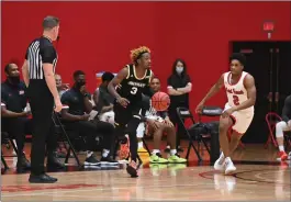  ?? Photo courtesy of Saint Francis Athletics ?? Bryant sophomore guard Michael Green III, above, made all six of his free throws in the second half to help the Bulldogs secure a72-63 victory over Saint Francis.