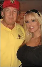  ??  ?? Paid off: Trump with Daniels