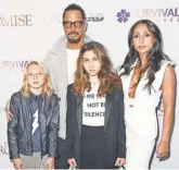  ?? NICHOLAS HUNT ?? Cornell, Vicky Karayianni­s, and their children, Christophe­r and Toni, attend the New York screening of The Promise in April.