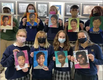  ?? NOTRE DAME PREP ?? Internatio­nal Baccalaure­ate art students who graduated in May display portraits before shipping them.