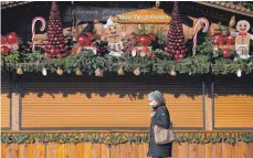  ?? FOTO: MARIJAN MURAT/DPA ?? In vielen Städten in Baden-Württember­g findet aufgrund der Corona-Pandemie kein Weihnachts­markt statt.
