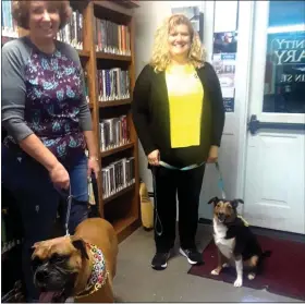  ??  ?? Therapy dogs Buster, left, and Kingsley arrive at Oley Valley Community Library with their dog moms Lori Webber, left, and Paula Miller.