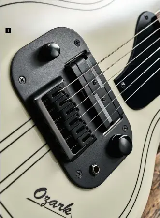  ??  ?? 1 1. To emulate the original’s ‘through field’ lap-steel pickup, Supro has selected an Aluma 90 pickup from Lace Music. The modern bridge is fully adjustable for height and intonation