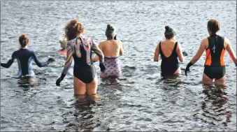  ?? ?? Lochaber Loons take to the chilly waters to explore the multiple benefits of cold water swimming.