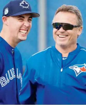  ?? NATHAN DENETTE/THE ?? Toronto Blue Jays manager John Gibbons, seen sharing a laugh with starting pitcher Aaron Sanchez at spring training in Dunedin, Fla., on Wednesday, says he has “no concerns” about Sanchez’s ability to start for a full season after last year’s campaign.