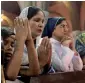  ?? AP ?? Christians attend a special prayer service for the victims of Sri Lanka’s blasts in Lahore on Sunday. —