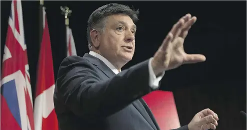  ?? CHRIS YOUNG / THE CANADIAN PRESS ?? Finance Minister Charles Sousa and the teams of bureaucrat­s who work away in the Frost Building at Queen’s Park have taken advantage of historical­ly low interest rates. They’ve locked in much of the province’s debt at current rates.