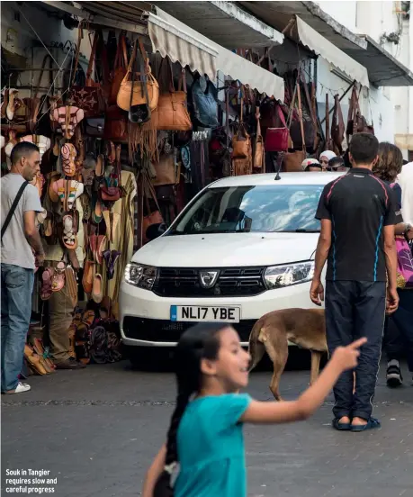  ??  ?? Souk in Tangier requires slow and careful progress