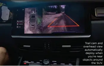  ??  ?? Trail cam and overhead view automatica­lly deploy when you're near objects around the SUV.