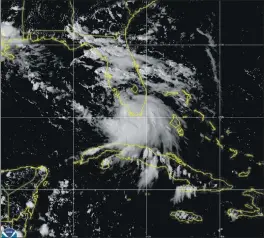  ?? NOAA VIA AP ?? This image from Saturday provided by NOAA shows the formation of Tropical Storm Sally. The tropical storm has formed off south Florida, becoming the earliest 18th named tropical storm on record in a busy Atlantic hurricane season.