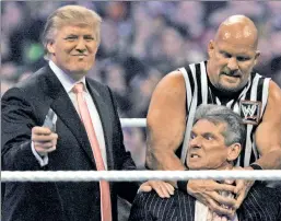  ??  ?? Fake, but accurate: The president, here with Steve Austin and WWE chief Vince McMahon, treats interactio­n with the press like a wrestling plot.