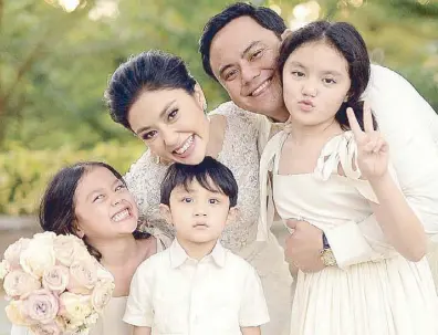 Paolo Tantoco and Dina Arroyo finally walk down the church aisle -  PressReader