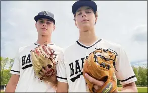  ?? Pete Paguaga / Hearst Connecticu­t Media ?? Joel Barlow baseball players Matt Scott and Will Scott pose Saturday at Barlow High in Redding. Falcons coach Matt Griffiths said “As much as Matt is the beating heart of our pitching staff, Will is the beating heart of our offense.”