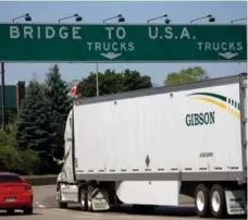  ?? MARK SPOWART/THE CANADIAN PRESS ?? From the U.S. to Canada, trade, travel, visa issuance and truck flow remain at pre-shutdown levels, but there’s no end in sight for the fiscal crisis.