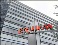  ?? MIKE STEWART/THE ASSOCIATED PRESS ?? This July 21, 2012, file photo shows Equifax Inc., offices in Atlanta. Equifax has taken down one of its web pages after reports that another part of its website had been hacked as well.