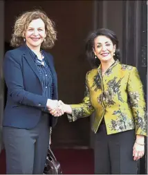  ??  ?? Looking for partners: Schippers (left) shaking hands with chairman of the Senate Khadija Arib in The Hague after the general election. — AFP