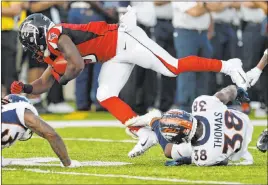  ?? Ron Schwane The Associated Press ?? Denver’s Shamarko Thomas (38) tackles Atlanta’s Marcus Green (3) on a punt return during the first half of the Pro Football Hall of Fame Game in Canton, Ohio.