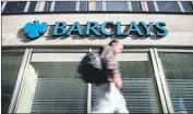  ?? Tolga Akmen AFP/Getty Images ?? BARCLAYS will pay $2 billion for its 2005-07 marketing of certain mortgage-backed securities.