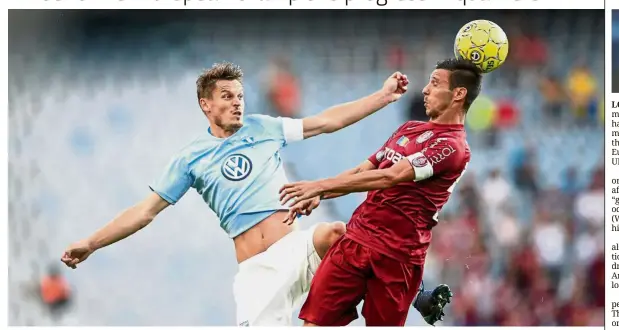  ??  ?? Let’s dance: Malmo’s Markus Rosenberg (left) fighting for the ball with CFR Cluj’s Camora during the UEFA Champions League second round, second leg qualifying match in Malmo, Sweden, on Wednesday. — AFP