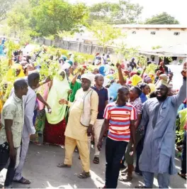  ?? Photo: NAN ?? Supporter of PDP governorsh­ip candidate in Bauchi State, Sen. Bala Mohammed at the Independen­t National Electoral Commission (INEC) office in Bauchi yesterday.