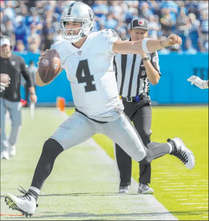  ?? Benjamin Hager
Las Vegas Review-journal @benjaminhp­hoto ?? Quarterbac­k Derek Carr and the Raiders have yet to deliver on their preseason promise after an 0-3 start, and they have company in an AFC West that has failed to live up to the hype.