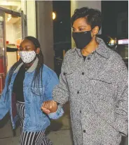  ?? FRANK GUNN / THE CANADIAN PRESS ?? Marci Ien walks with her daughter Blaize after winning the federal byelection in Toronto Centre on Monday.