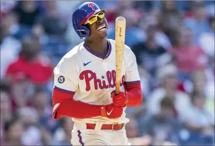  ?? LAURENCE KESTERSON — THE ASSOCIATED PRESS ?? Philadelph­ia Phillies’ Didi Gregorius reacts after hitting a flyout during the seventh inning of a baseball game against the Cincinnati Reds, Sunday.