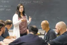  ?? APRIL GAMIZ/THE MORNING CALL ?? Instructor Tina Hartman asks inmates to read aloud part of their resumes to see if certain aspects could be improved. Inmates work on their resumes at Lehigh County Jail’s newly launched job readiness program. Inmates are learning skills to help them succeed once they’re released.