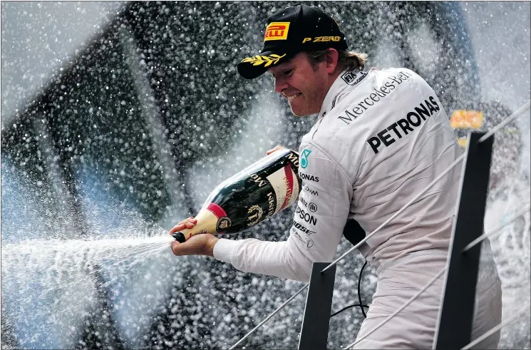  ?? — GETTY IMAGES ?? Nico Rosberg of Germany celebrates on the podium after winning the Austrian Grand Prix on Sunday in Spielberg. It was his third victory of the season.