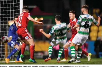  ?? EÓIN NOONAN/SPORTSFILE ?? Roberto Lopes (4) scores Shamrock Rovers’ third goal against Cork City last night