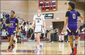  ?? CONTRIBUTE­D PHOTO ?? Faith Lutheran senior Graydon Lemke, center, walks up the court during a game against Sunrise Mountain. Lemke, who led the Crusaders in scoring at 17 points per game this season and was the team captain, is a finalist for a national honor being announced today.