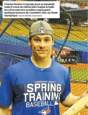  ?? PHOTO PIERRE DUROCHER ?? Charles Hudon n’a jamais joué au baseball, mais il a tout de même bien frappé la balle lors d’un exercice au bâton regroupant quelques joueurs du Canadien, hier, au Stade olympique.