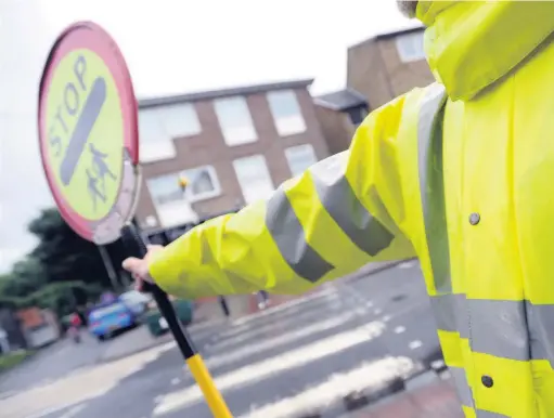  ??  ?? School crossing patrols are under threat in Bridgend