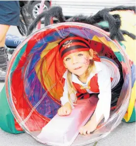  ?? ?? Kaimanu Shortcliff­e tries out Te Puke Gymsports equipment — complete with spooky spider.