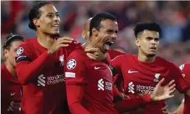  ?? Anfield. Photograph: Marc Atkins/Getty Images ?? Joël Matip screams with joy after Liverpool’s late winner against Ajax took the roof off