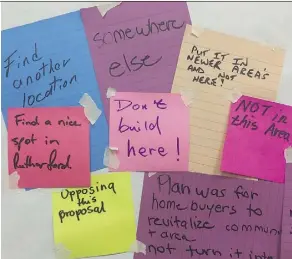  ?? ELISE STOLTE/FILES ?? The city encourages people to write messages on sticky notes at many of their open house-style public engagement events.