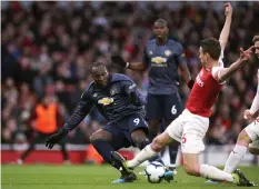  ?? SUPPLIED ?? ROMELU LUKAKU shoots as Laurent Koscielny attempts to block the striker’s shot at the Emirates Stadium yesterday. |