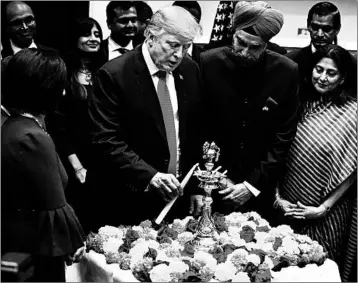  ?? ALEX WONG/GETTY ?? President Donald Trump celebrates Diwali, the Hindu festival of lights, during a ceremony Tuesday in the White House.