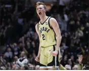  ?? MICHAEL CONROY – THE ASSOCIATED PRESS ?? Purdue guard Fletcher Loyer, who scored 17 points, is fired up after hitting a 3-pointer against Iowa on Thursday night.