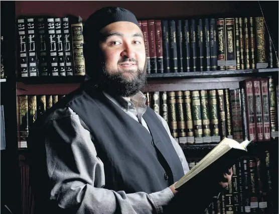  ?? LEAH HENNEL/ CALGARY HERALD ?? Navaid Aziz is an imam with the Islamic Informatio­n Society of Calgary, based at the 8th and 8th Musallah mosque in downtown Calgary. He briefly knew Farah Mohamed Shirdon, who left the city in early 2014 to join ISIL. Aziz says Shirdon began picking...