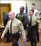  ??  ?? Brent Marsh being escorted from Walker County Superior Court in November 2004 after pleading guilty. Marsh was released from prison in July 2016. (Walker County Messenger file photo)