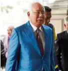  ?? — AP ?? Day in court: Najib arriving at the Kuala Lumpur High Court.